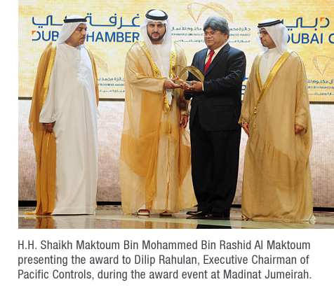 H.H Shaikh Maktoum Bin Mohammad Bin Rashid Al Maktoum presenting the award to Dilip Rahulan, Executive Chairman of Pacific Controls, during the award event at Madinat Jumeirah.